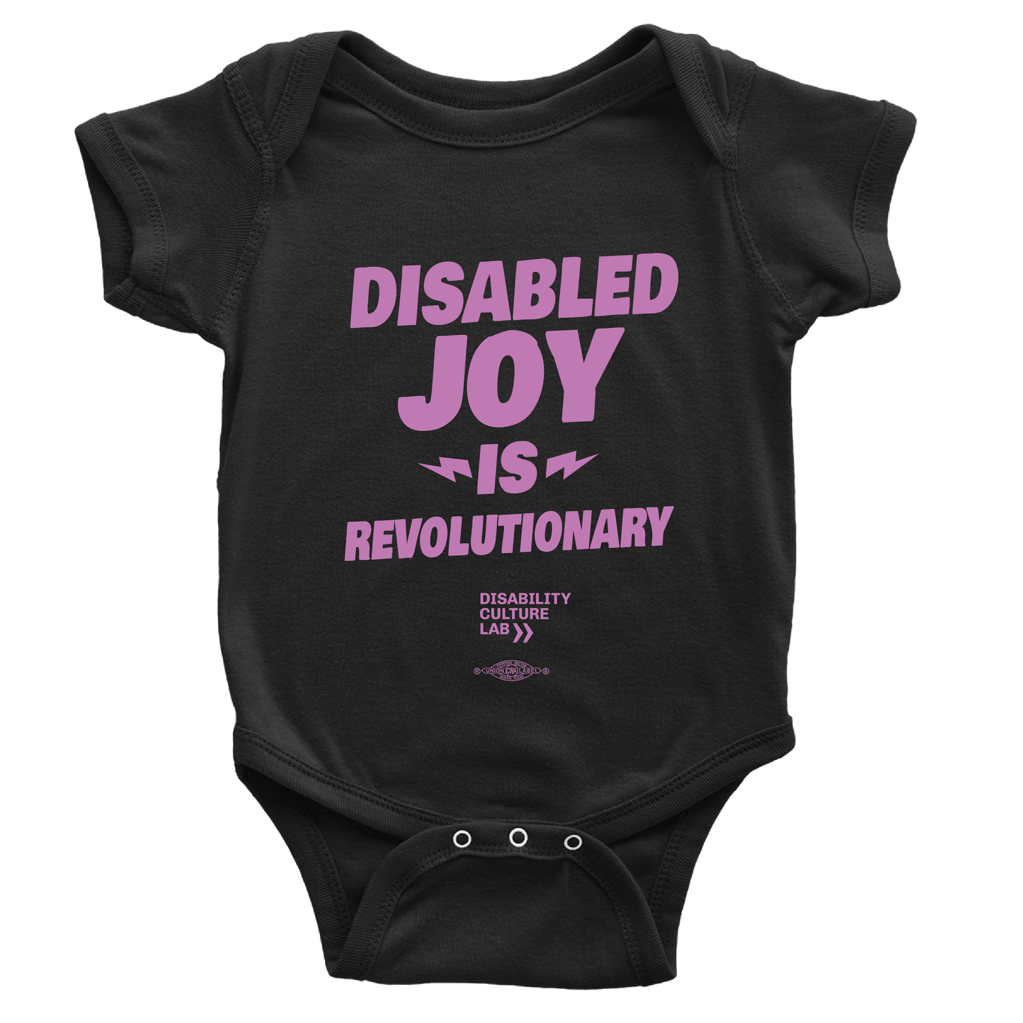 A black baby onsie that says "Disabled Joy is Revolutionary."
