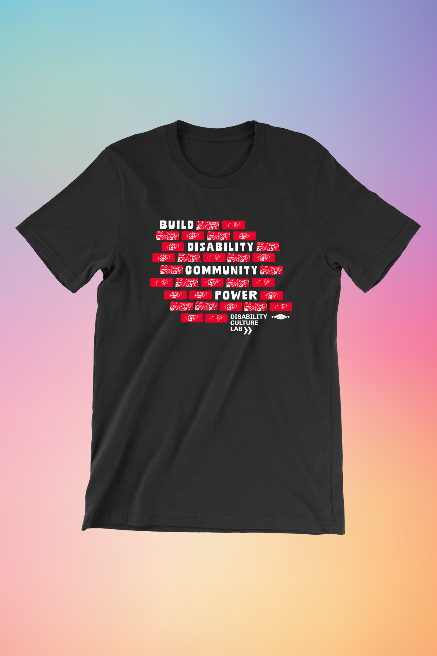 A black short sleeved T-shirt with a design of red bricks in the middle of the shirt. The bricks are surrounding bold white text that reads "Build Disability Community Power." Beneath the bricks is the white Disability Culture Lab logo with two white arrows.