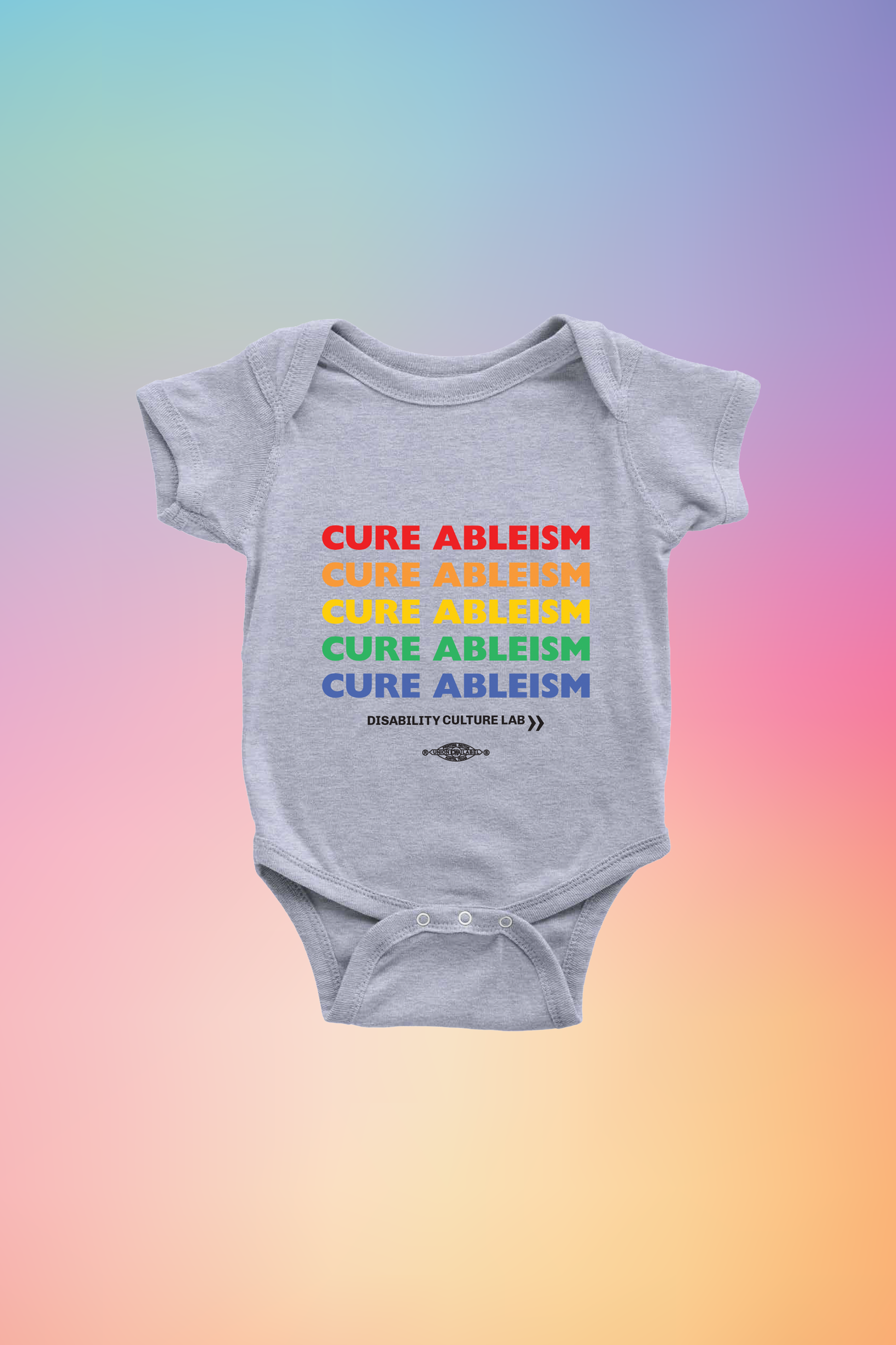 A gray onesie that reads "Cure Ableism" five times in red, orange, yellow, green, and blue, and the white Disability Culture Lab logo. 