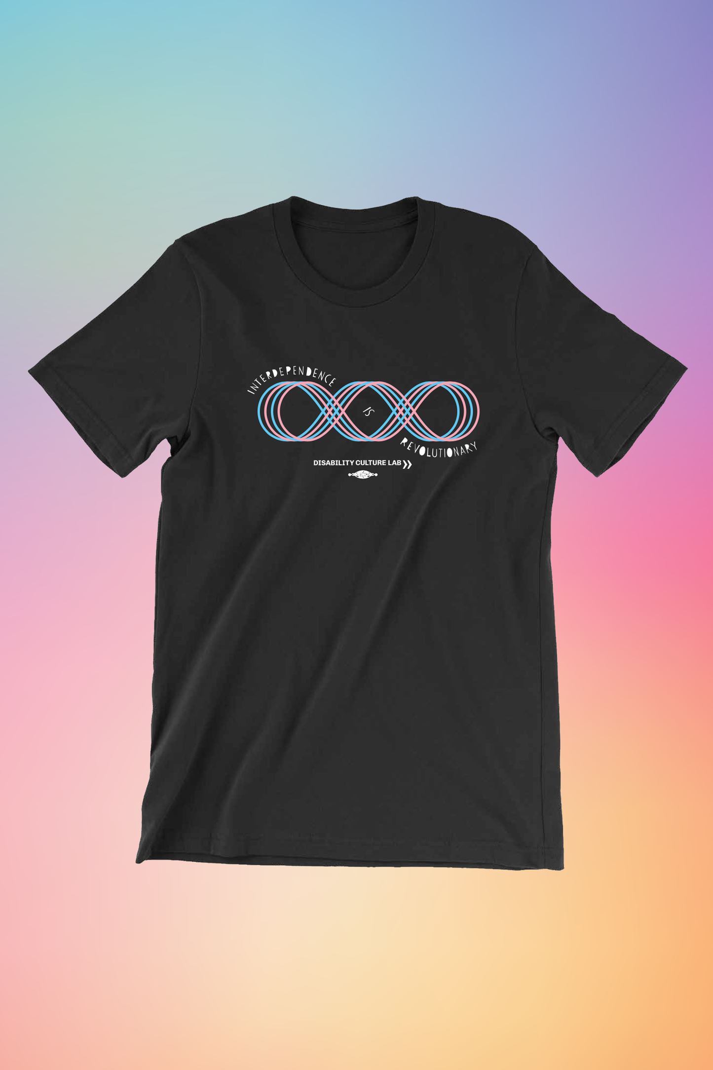 A black short sleeve T-shirt with a four line loop, like an infinity sign with an extra loop added to it. The loop lines are in blue and pink. The loops are a Contra dance diagram of a "Hey for Four," which is a dance move done with four dancers taking turns weaving through each other. Text reads, "Interdependence Is Revolutionary" and starts at the top left of the diagram, weaves into the center of the diagram and then ends at the bottom right. Below is the white Disability Culture Lab logo.