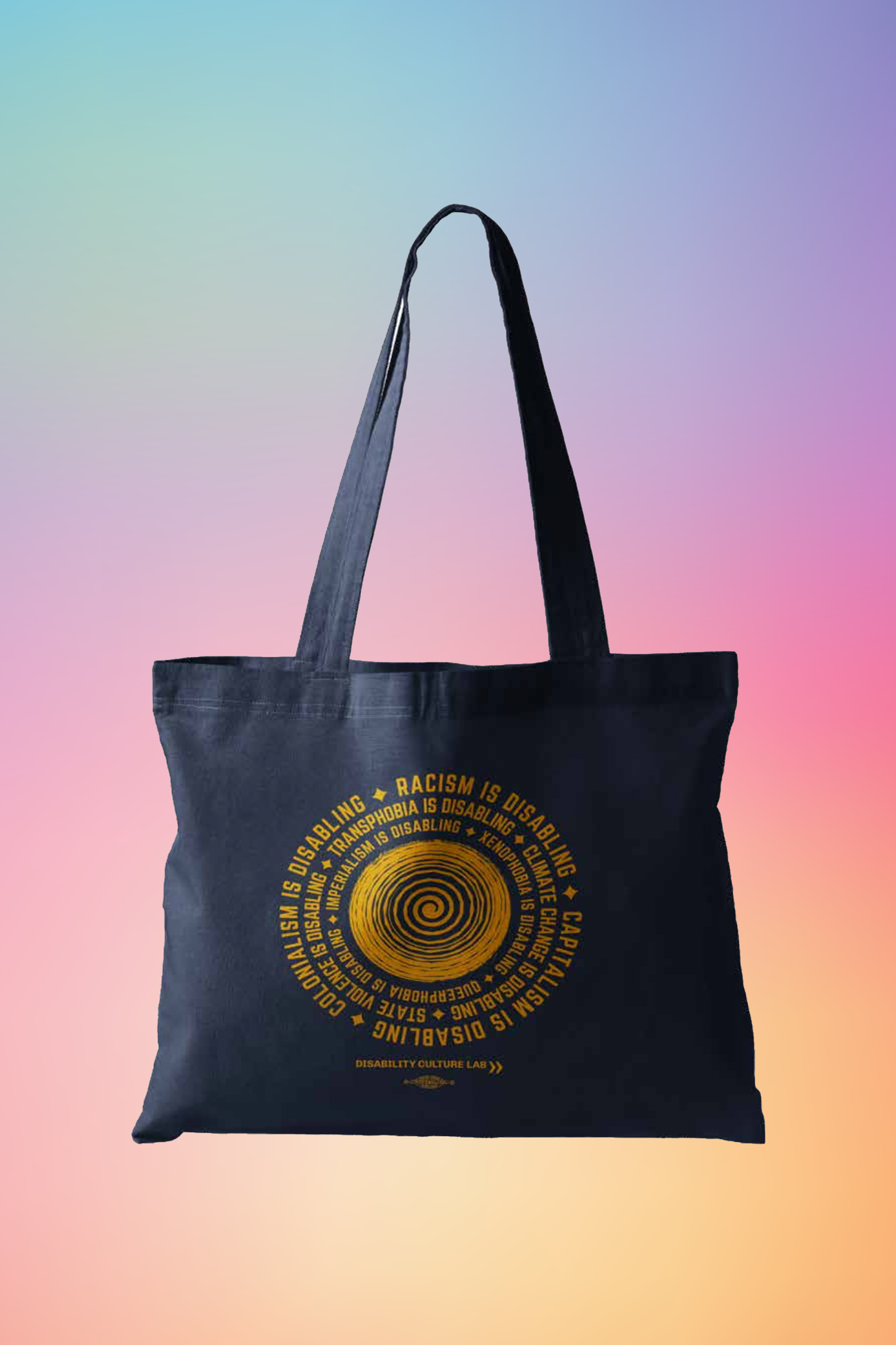 A navy blue tote bag with a circular design in the middle. In the center of the design there's an orange spiral, with an orange text surrounding it in a circle that reads "Racism is disabling. Capitalism is disabling. Colonialism is disabling. Transphobia is disabling. Climate change is disabling. State violence is disabling. Imperialism is disabling. Xenophobia is disabling. Queerphobia is disabling." In between each sentence is an orange star. Below the design is the Disability Culture Lab logo in orange.