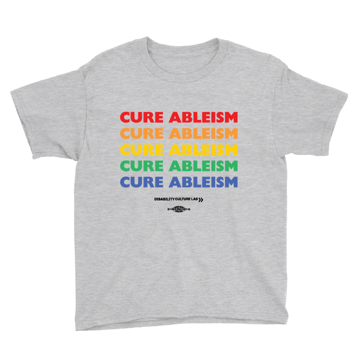 A gray T-shirt that reads "Cure Ableism" five times in red, orange, yellow, green, and blue, and the white Disability Culture Lab logo. 