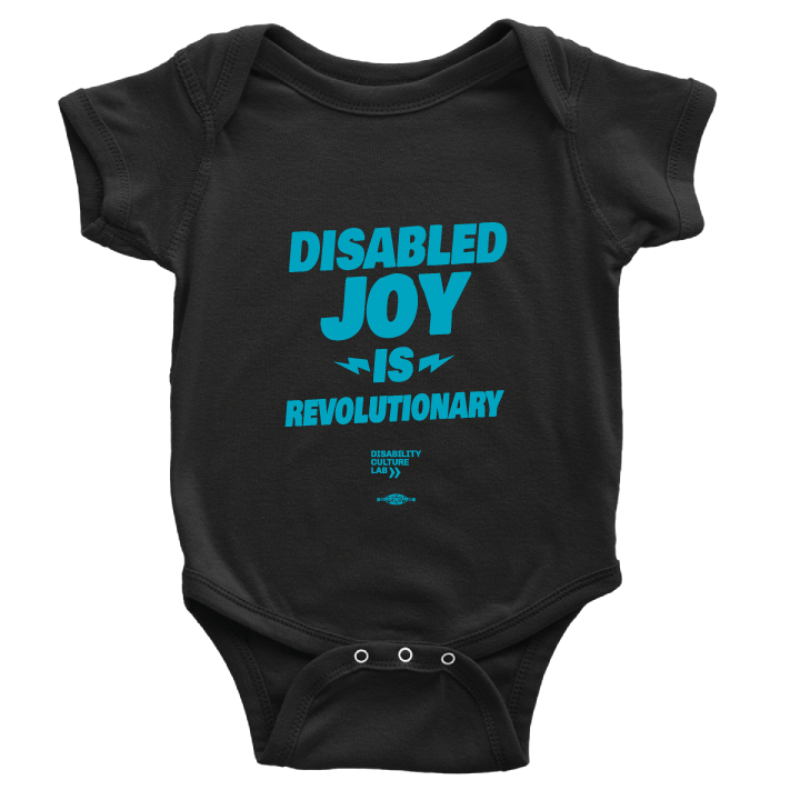 Black onesie with the turquoise words "Disabled Joy Is Revolutionary" and the turquoise Disability Culture Lab logo. 